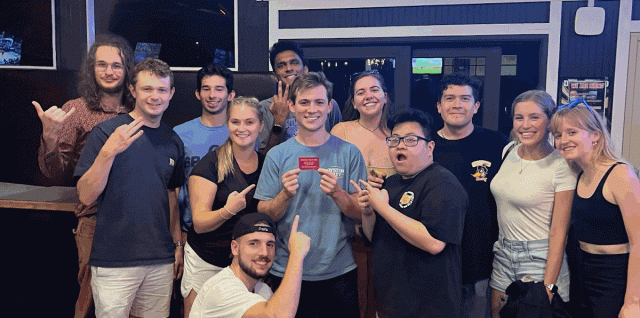 Group of students celebrating trivia win